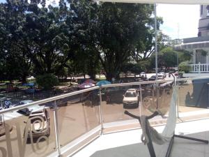 a balcony with a view of a parking lot at Hotel Nayarith in Acacías