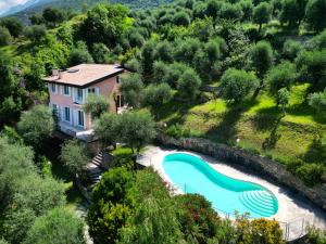 an aerial view of a house with a swimming pool at Villa Incanto Adults Only in Brenzone sul Garda