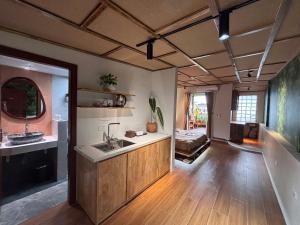 a large room with a sink and a counter at Gasu home in Ninh Binh