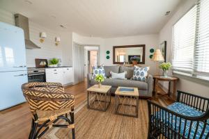 a living room with a couch and a table at The Star Inn in Cape May