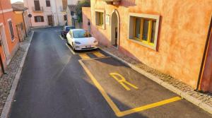 a car parked on the side of a street at The Sea Wind Apartments & Suites in Palau