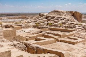 a sand castle in the middle of a desert at XIVA AZIM OTA in Khiva