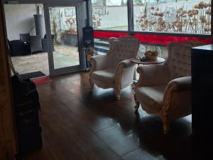 Svetainės erdvė apgyvendinimo įstaigoje Hotel Maxsoyi