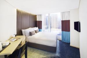 Krevet ili kreveti u jedinici u okviru objekta Hotel 108, Hong Kong