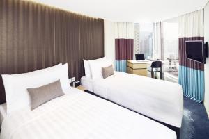 Krevet ili kreveti u jedinici u okviru objekta Hotel 108, Hong Kong