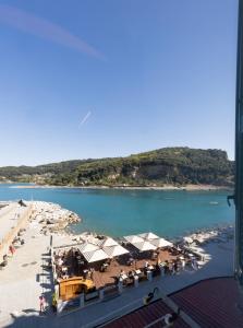 a view of a beach and the water at Vongola in Portovenere