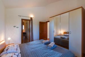 a bedroom with a bed and a large mirror at Villa Antonela in Divšići +31 photos