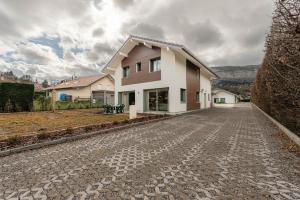 a house on a cobblestone street at Villa Mareyland Saint-Jorioz, in Saint-Jorioz