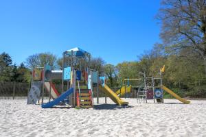 a playground in the sand on a beach at Residence de Eese in De Bult +39 photos