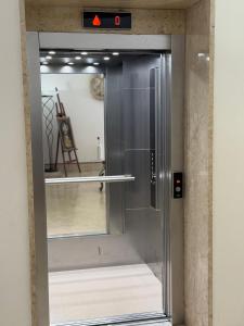 a sliding glass door leading into a room at Albergo Russo in Trapani