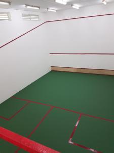 an empty room with a ping pong court at Dandimayo Hotel Bar & Restaurant in Serekunda