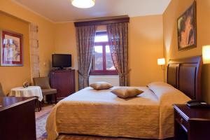 Postel nebo postele na pokoji v ubytování Amanites Guesthouse
