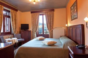 Postel nebo postele na pokoji v ubytování Amanites Guesthouse