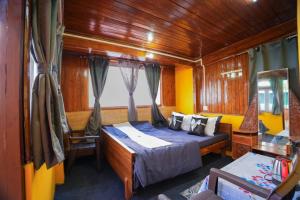 a bedroom with a bed on a boat at Dixit Homestaay & Hostel in Darjeeling