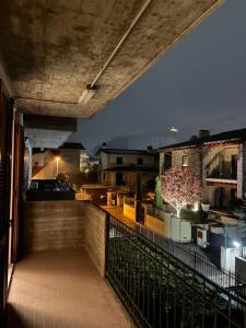 a view from the balcony of a building at night at Casa Serena - Sarnico in Sarnico