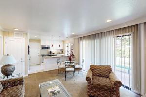 a living room with a couch and a table at Silverado Resort and Spa 374 & 375 in Napa +42 photos
