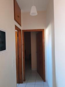 an empty room with a hallway with a ceiling at Real Apartment Αληθινή Διαμονή in Diakopto