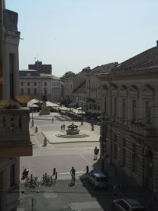 a view of a courtyard in a city with buildings at Klauzál Apartment in Szeged