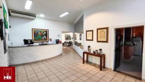 a lobby of a restaurant with a counter and aacistacistacistacist at Hotel Bruggemann in Florianópolis +34 photos