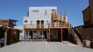 a house under construction with a house being built at Pichilemu Apart Hotel in Pichilemu