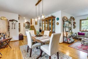 a dining room with a table and chairs at Eclectic Multi-Level Charmer! 2 Mi to CU Boulder in Boulder