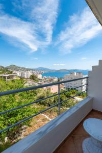 a balcony with a view of the ocean at León Hotel Saranda in Sarandë