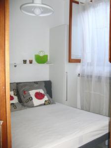 Кровать или кровати в номере Portovenere Casa Konrad e Maria