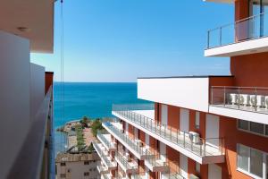 a view of the ocean from a building at Hotel Sea View Shëngjin in Lezhë