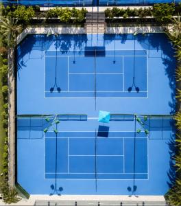 an overhead view of a tennis court at Palmilla Dunes Luxury Residences in San José del Cabo +269 photos