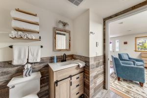 a bathroom with a toilet and a sink at Walkable, Dog Friendly! Friday Harbor Stay w/ Deck in Friday Harbor +17 photos
