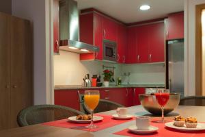 Kuchyňa alebo kuchynka v ubytovaní MH Apartments Gracia