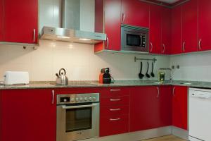 Kuchyňa alebo kuchynka v ubytovaní MH Apartments Gracia