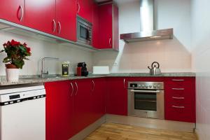 Kuchyňa alebo kuchynka v ubytovaní MH Apartments Gracia