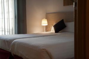 Posteľ alebo postele v izbe v ubytovaní MH Apartments Gracia