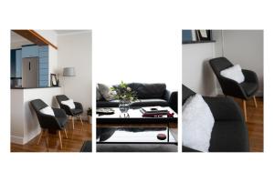 a living room with a couch and chairs and a table at Oly modern apartment in Katerini