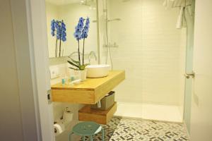 Kúpeľňa v ubytovaní Hotel & Apartaments Thalassa Sport & Spa