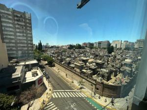 an aerial view of a city with buildings and a street at MONS hostel in Buenos Aires