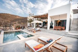 a house with a swimming pool and a patio at Montebello Pool House-3 BD in Los Barriles