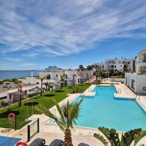 an image of a swimming pool at a resort at 322 - Magnificent Penthouse Firstline Golf & Beach in San Roque