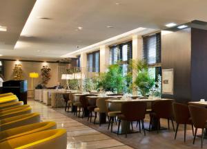 
A restaurant or other place to eat at TURIM Marques Hotel
