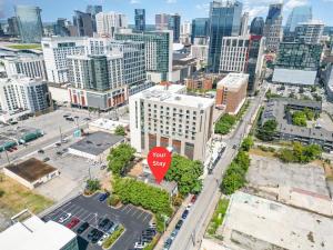 an aerial view of a city with a stop sign at Rutledge After Dark - Walk to Broadway & The Gulch in Nashville
