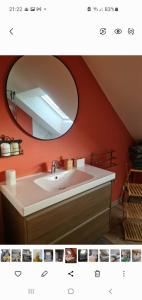 a bathroom with a sink and a mirror at Gîte Au Val de Belvâ in Malmedy +48 photos