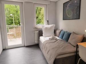 a living room with a couch and a window at Fata Morgana in Cochem