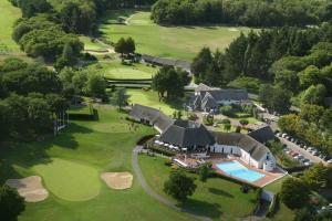 an aerial view of a house and golf course at Villa 96 Golf de la Baule avec piscine et spa in Saint-André-des-Eaux