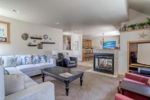 a living room with a couch and a fireplace at A Mermaids Dream in Pacific City