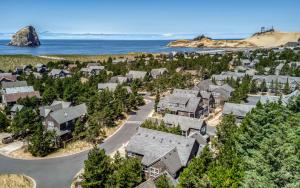 an aerial view of a village with houses and the ocean at A Mermaids Dream in Pacific City