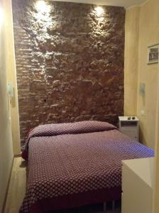 Posteľ alebo postele v izbe v ubytovaní B&B In Piazza