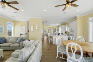 a living room with a couch and a table at USA II in Gulf Shores