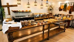 a buffet line with pastries and other food items at Penzion Pibernik in Bled