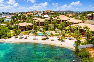 an aerial view of the resort and the beach at JeVakantie Spanish Water Apartments B7 and C8 with Infinity Pool near Jan Thiel in Willemstad